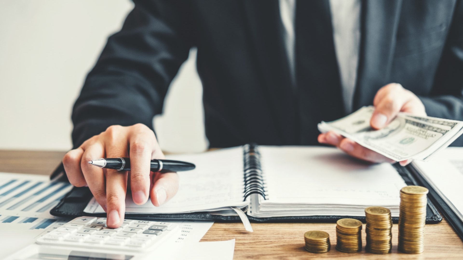 business-man-accounting-calculating-cost-economic-budget-investment-saving