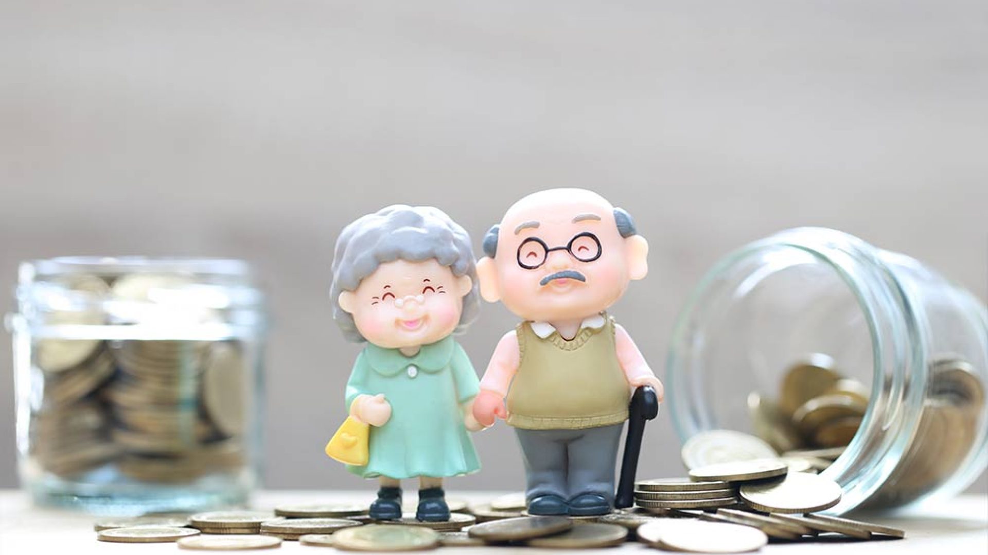 mutual-fundlove-couple-senior-gold-coin-money-glass-bottle-white-background-save-money-prepare-future-pension-retirement-concept