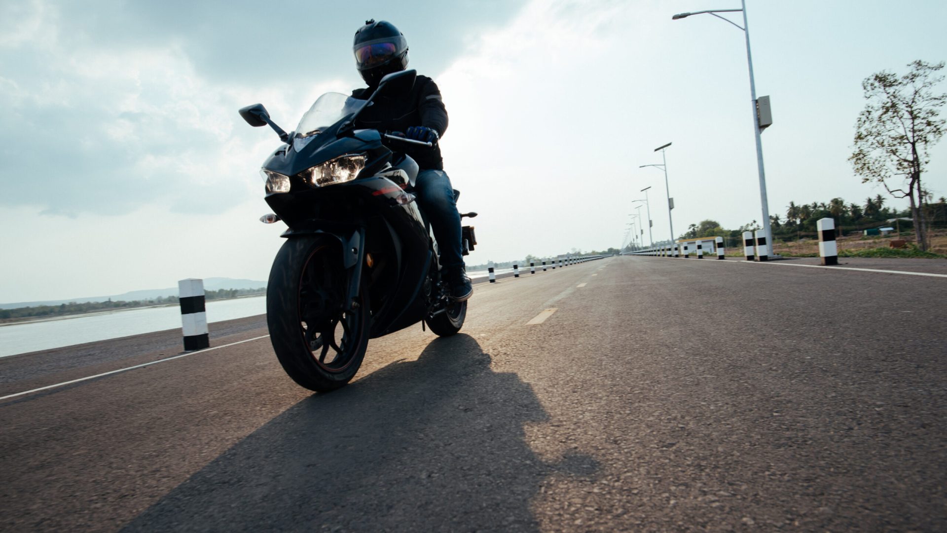 Rider Motorbike on the road riding. having fun driving the empty road