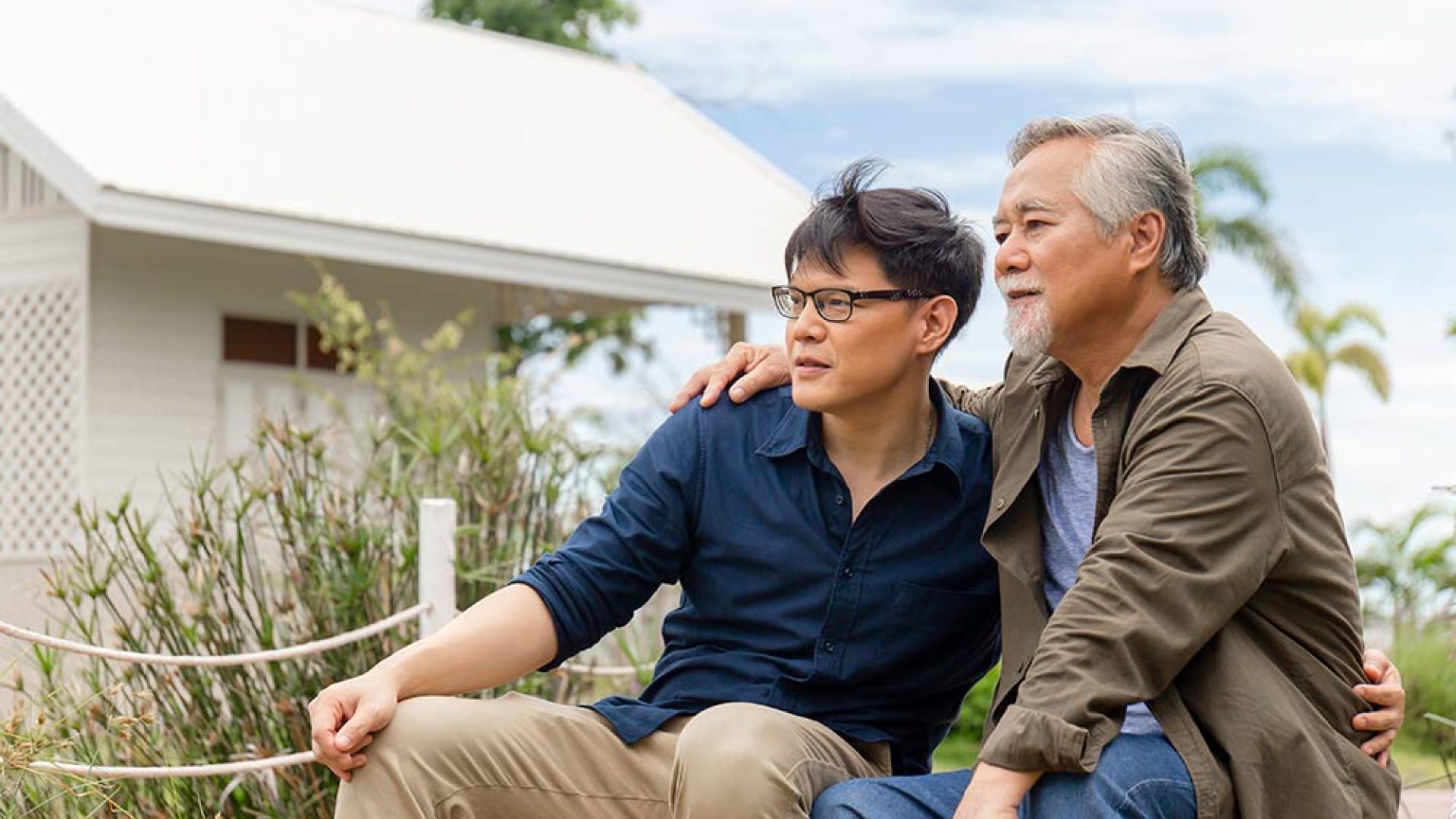 senior-asian-father-middle-aged-son-sitting-relax-together-outdoors-happiness-asian-family-concepts