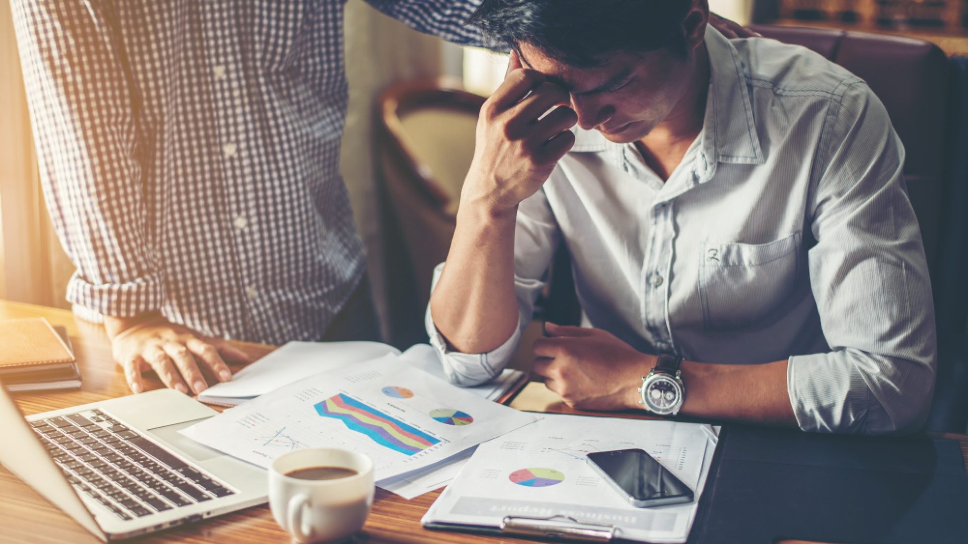 serious-young-businessman-looking-financial-report-seem-like (2)
